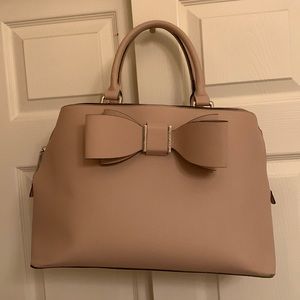 Tan Betsy Johnson tote bag with floral pink/black interior with 7 pockets